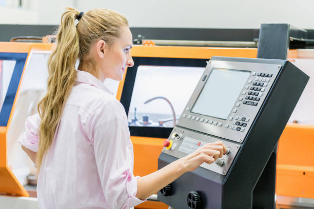 a lady working on cnc programming